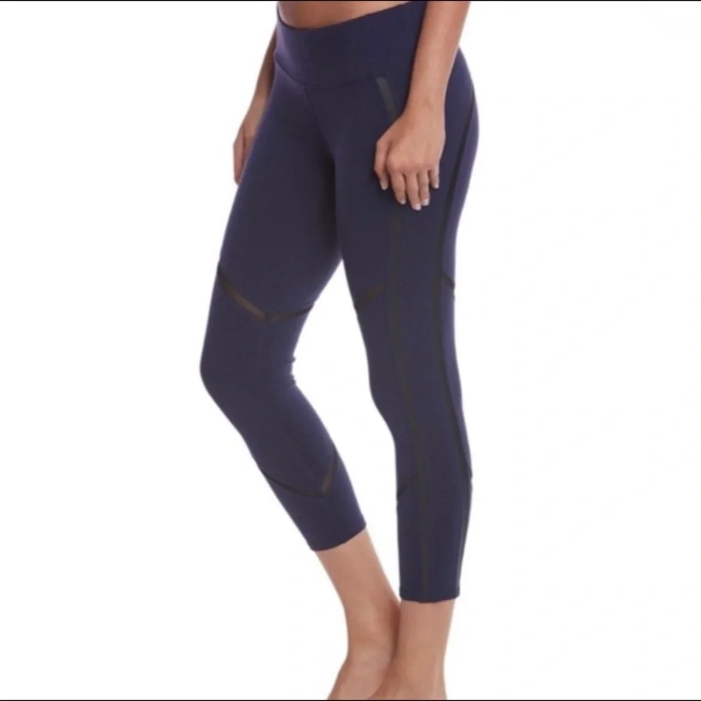 ALO Yoga Continuity Capri Legging In Rich Navy